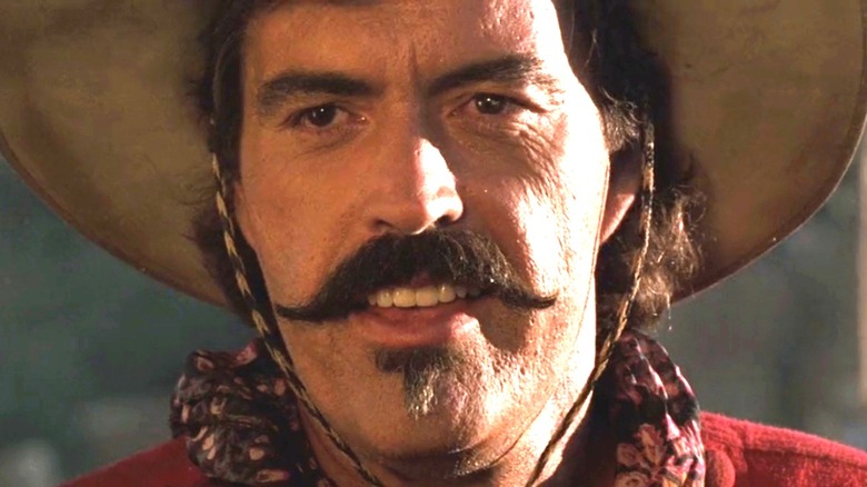 Powers Boothe Curly Bill souriant