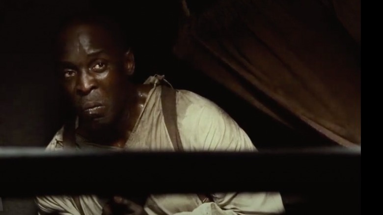 Michael K. Williams dans le rôle de Robert dans 