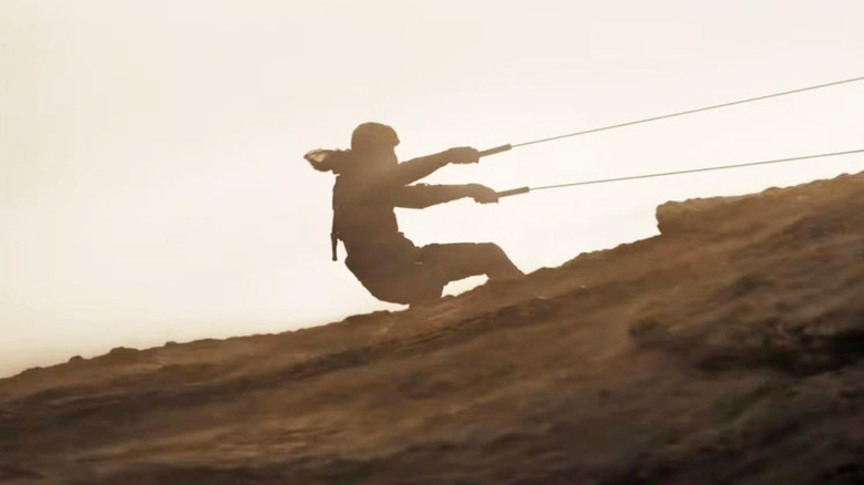 Paul Atreides chevauchant un ver des sables